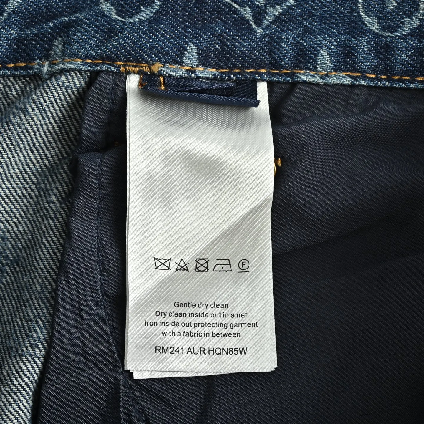 Louis Vuitton/Louis Vuitton all-over logo daisy embroidered jeans